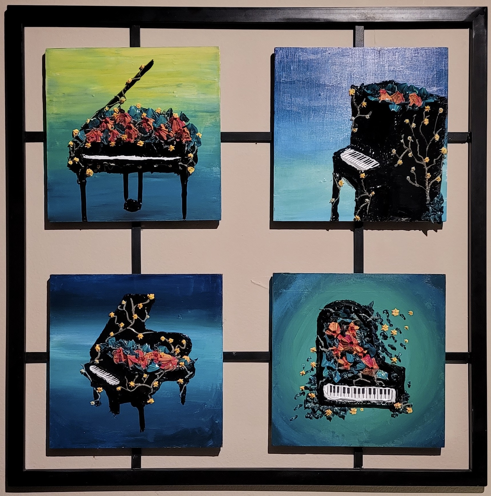 Four piano paintings with florals inside each piano